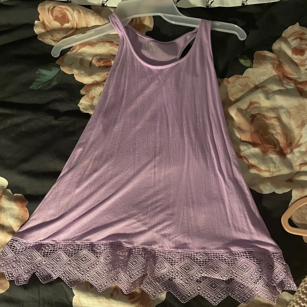 Purple tank with designed ruffles on bottom